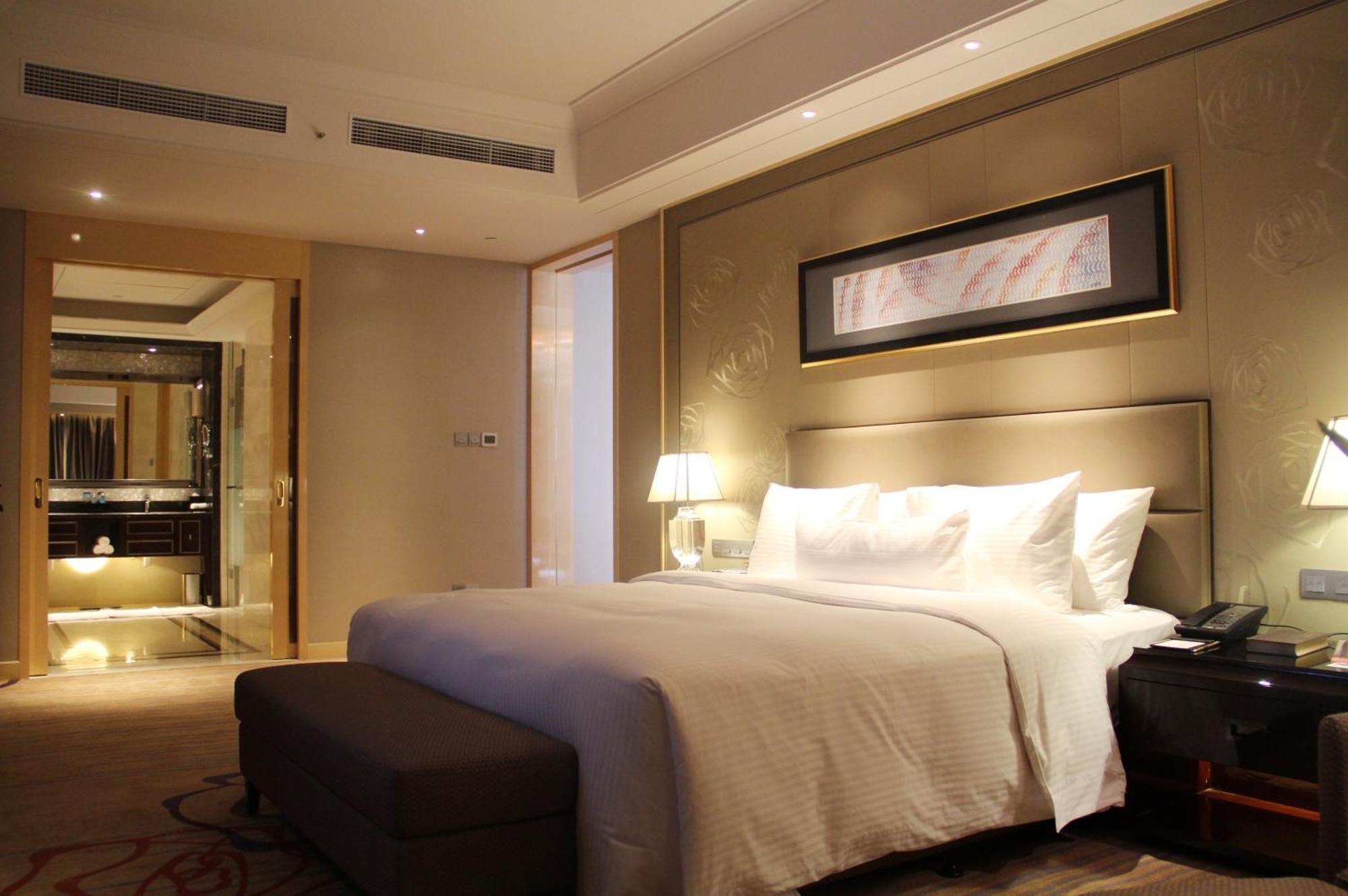 Hotel Wanda Realm Longyan Pokoj fotografie