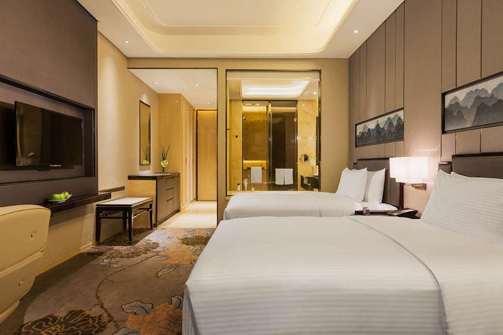Hotel Wanda Realm Longyan Pokoj fotografie